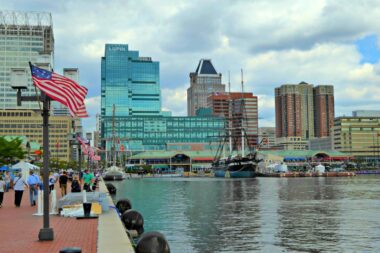Baltimore, home of the Star Spangled Banner, with a busy harbor where you can often see the American Flag waving.