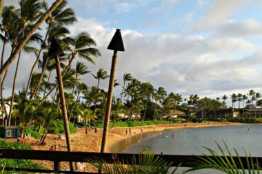 One of Hawaii's many relaxing beachs for mom includes Napili Kai Beach Resort in Maui.