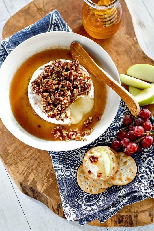 Honey & Nut Glazed Brie – Easy breezy Brie is given the royal treatment in this two-step appetizer staple.