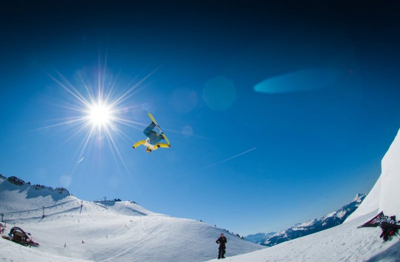 Challenge yourself with an extreme sport - snowboarding in Austria, 1 of 5 travel destinations to improve your health and wellbeing.