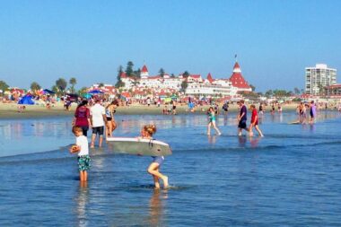 Empty nest travel tips include taking out a map and exploring different areas and hotels near your adult kids home, such as Hotel Del Coronado in California.