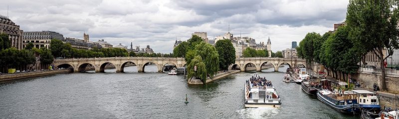 This panoramic view of Paris at the Pont Neuf Bridge on the Seine River is one of the many reasons why this is a top place to visit in France.