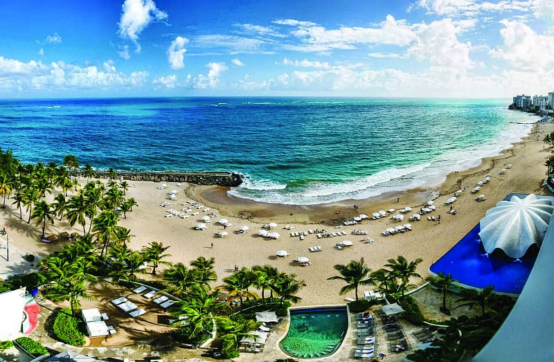 Check out this  Turn Up Your Weekend Package, 1 of 5 Summer Hotel Travel Deals to San Juan, Puerto Rico. Photo Credit: La Concha Resort