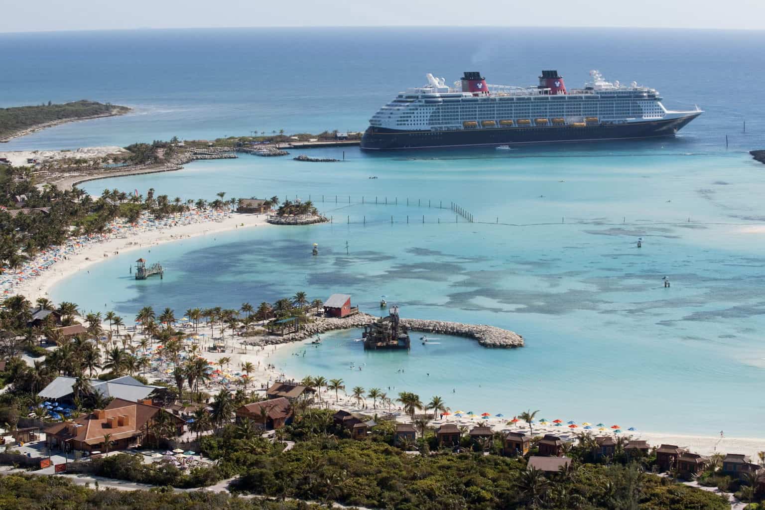 he Disney Dream docks at Castaway Cay, Disney's private island in the tropical waters of the Bahamas, reserved exclusively for Disney Cruise Line guests. In a setting of crystal-clear turquoise waters, powdery white-sand beaches and lush landscapes, the 1,000-acre island offers one-of-a-kind areas and activities for every member of the family. (David Roark, photographer)