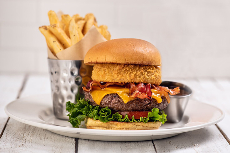 Dig into this Legendary Steak Burger at the Hard Rock Cafe, a NYC restaurant near the Yankee Stadium. Photo: Hard Rock Cafe