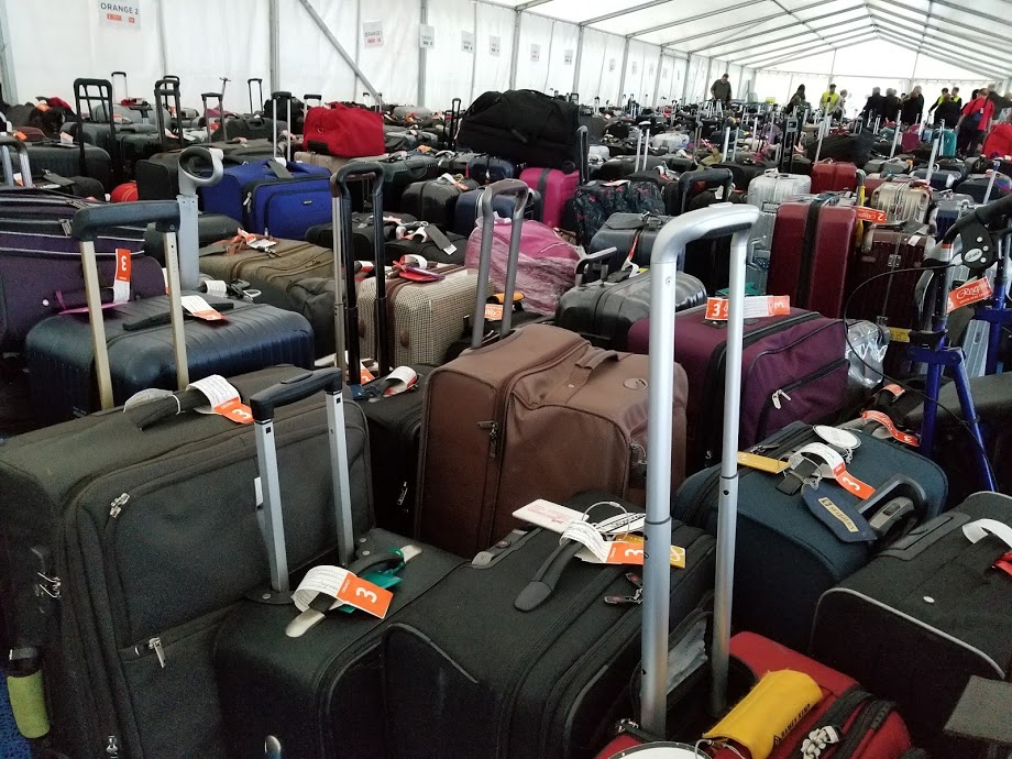 All luggage look alike, so when purchasing suitcases for the grandparents, be sure to AVOID black. Pick a a color that stands out in a sea of black luggage!
