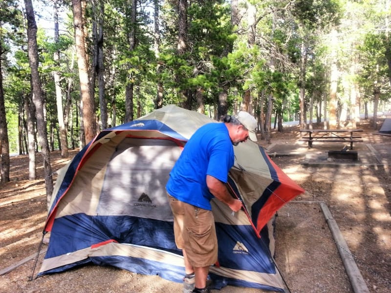 Before departing, one of the most important camping tips is to check your gear and set up your tent before leaving for your family vacation. 