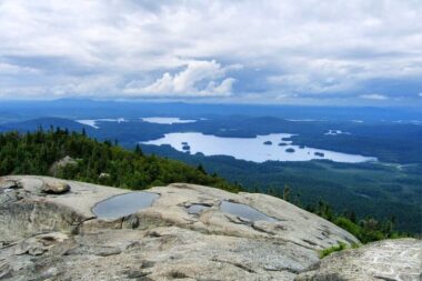 Ampersand Mountain is a 3,352 ft mountain in Franklin County in the High Peaks Wilderness Area of the northeastern Adirondacks, west of the High Peaks proper in New York State.