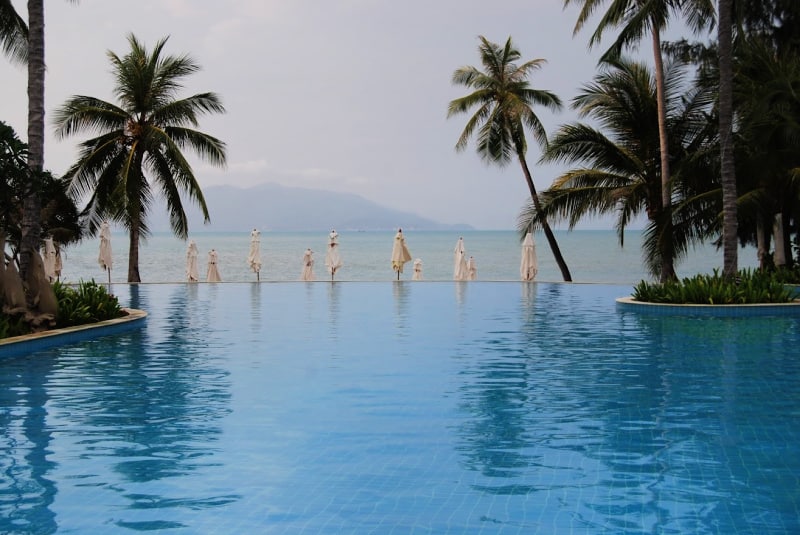 Ultimate luxury pool features include infinity pools like this one at Melati Beach Resort & Spa in Koh Samui, Thailand