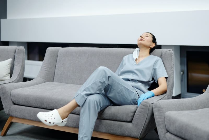 healthcare-job-traveler-resting-couch-pexels